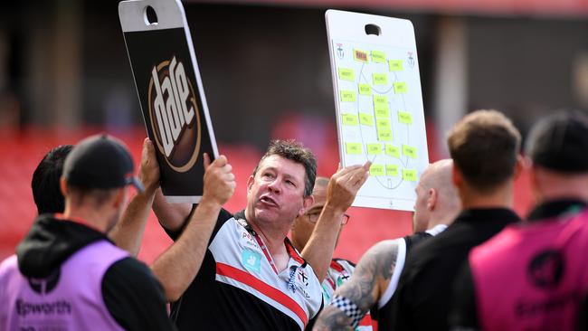 Brett Ratten addresses his players during the match against the Hawks. Picture: Matt Roberts/AFL Photos/via Getty Images