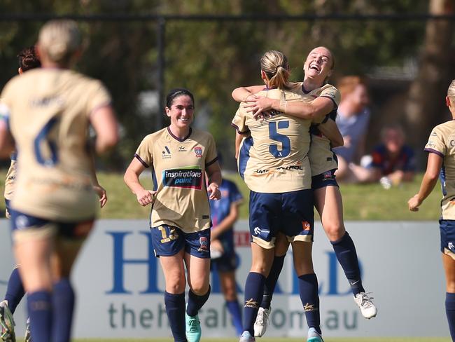 NEWCASTLE, AUSTRALIA - NOVEMBER 19: Lara Gooch of the Jets celebrates a goal with team mates during the A-League Women round five match between Newcastle Jets and Melbourne City at No. 2 Sports Ground, on November 19, 2023, in Newcastle, Australia. (Photo by Scott Gardiner/Getty Images)