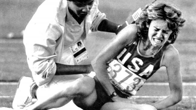 Mary Slaney (nee Decker) assisted after falling during the women's 3000m race after being tripped by competitor Zola Budd at the 1984 LA Olympics.