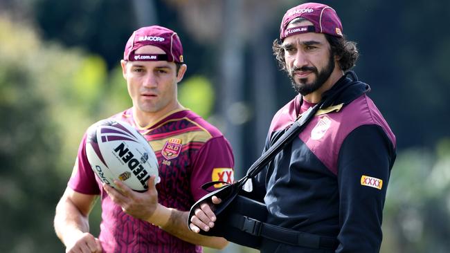 Queensland legends Cooper Cronk and Johnathan Thurston are both expected to assist coach Kevin Walters during the Maroons’ Origin preparations in 2018. Photo: Dave Hunt