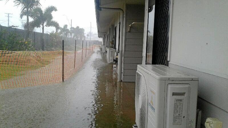 Water up to the doorsteps of residents&#39; homes. Picture: Contributed