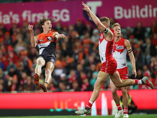 Lachie Whitfield snaps at goal for the Giants against Sydney. Picture: Phil Hillyard