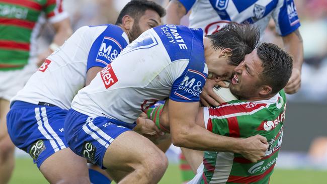 Lachlan Lewis takes on Sam Burgess. Picture: AAP Image/Craig Golding