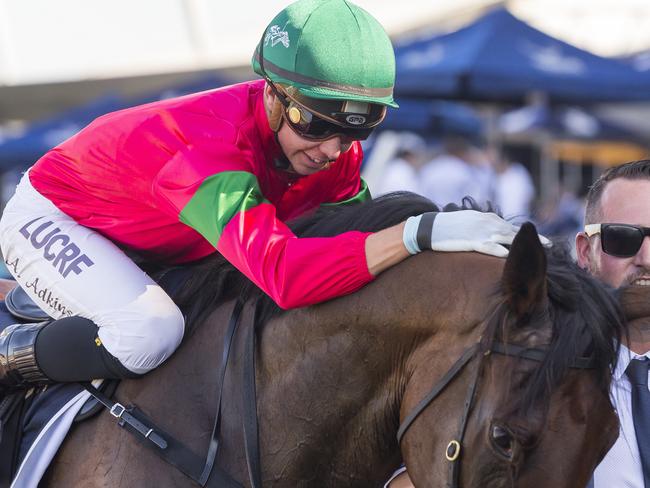 Andrew Adkins returns to scale after riding Daysee Doom to victory. Picture: AAP