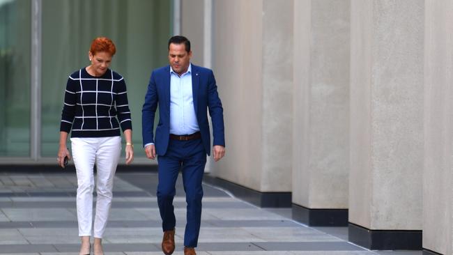 One Nation senators Pauline Hanson and Peter Georgiou arrive at yesterday’s press conference.