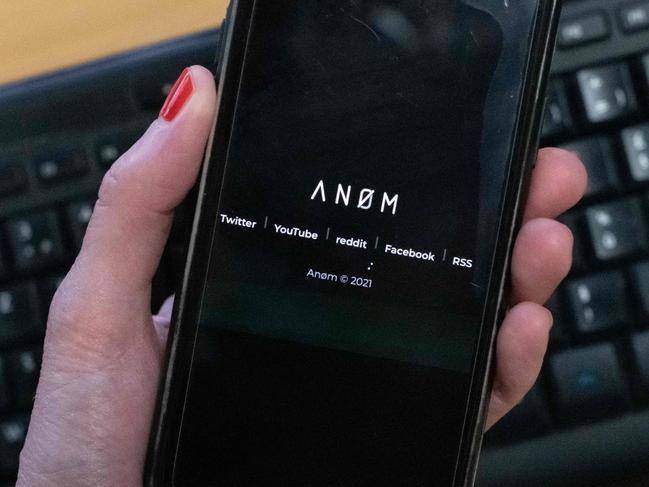 The ANoM app appears on the screen of a smartphone in Paris, on June 8, 2021. - Some 250 people were arrested in Sweden and Finland in the global sting on organised crime, authorities said on June 8, 2021, using phones planted by the US FBI, law enforcement officers were able to read the messages of global underworld figures in around 100 countries as they plotted drug deals, arms transfers and gangland hits on the compromised ANOM devices. (Photo by Olivier MORIN / AFP)