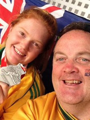 Alex Hulley and her overjoyed dad Matthew with the silver medal.