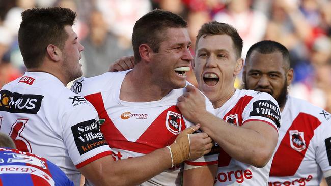 Jeremy Latimore of the Dragons celebrates scoring a second-half try during the Round 25 NRL match between the Newcastle Knights and the St George-Illawarra Dragons at McDonald Jones Stadium in Newcastle, Saturday, September 1, 2018. (AAP Image/Darren Pateman) NO ARCHIVING, EDITORIAL USE ONLY