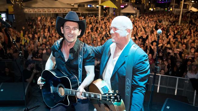 Lee Kernaghan joins James Blundell onstage in Surf Parade on the final night of the 2018 Groundwater Country Music Festival, part of Broadbeach promotion.