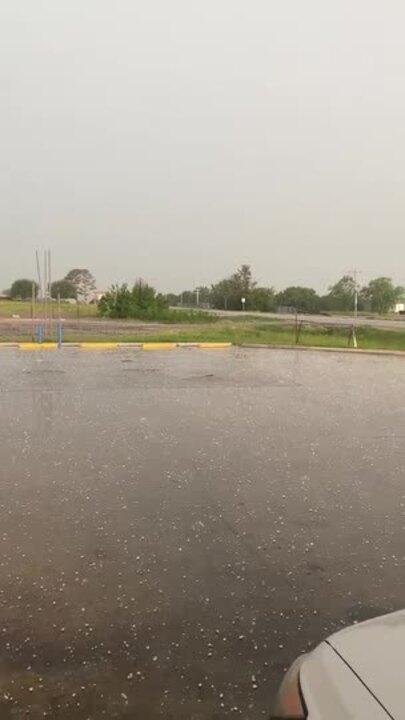 Hail Batters Parking Lot as Storm Passes Through Central Oklahoma