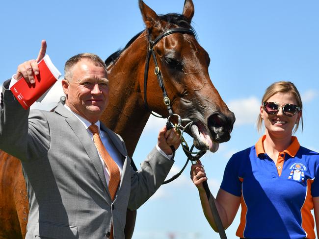 Trainer Tony MvEvoy with Sunlight after winning the Thoroughbred Club Stakes.