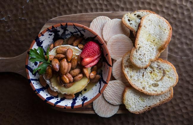 The baked brie with apricot jam and almonds.