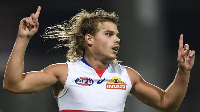 Bailey Smith of the Bulldogs celebrates after kicking a goal. Picture: Ian Hitchcock/Getty