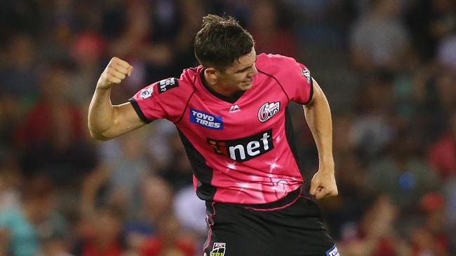 MELBOURNE, AUSTRALIA - DECEMBER 29: Sean Abbott of the Sixers celebrates aftre claiming the wicket of Dan Christian of the Renegades during the Big Bash League match between the Melbourne Renegades and the Sydney Sixers at Marvel Stadium on December 29, 2018 in Melbourne, Australia.  (Photo by Mike Owen/Getty Images)