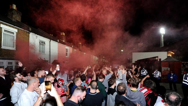 Brentford fans celebrate their playoff semifinal win.