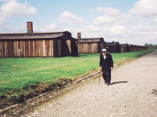 Dr Henry Bernard walking in Field A at Auschwitz on one of his return trips to Poland.