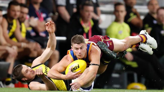 Baker got up laughing after Dayne Zorko crashed into him in Round 23.