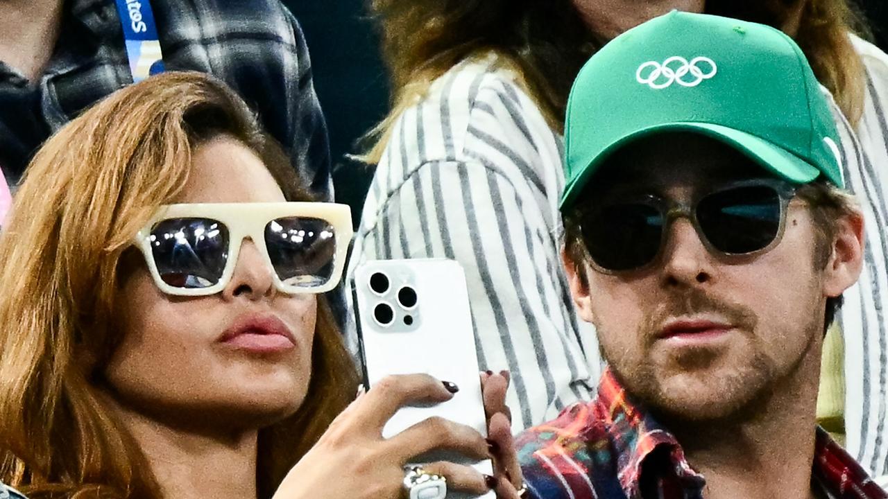 US actor Eva Mendes and actor husband Ryan Gosling watch the gymnastics at Bercy Arena. Picture: AFP