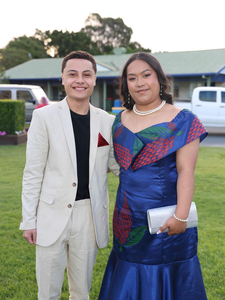 Jodieci Harris and Fatalupe Tiomai at Coombabah State 2024 High School Formal at the Gold Coast Turf Club. Picture: Portia Large.