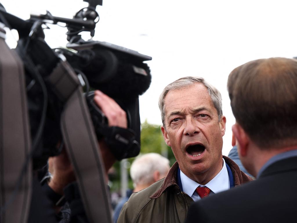 Leader of Reform UK Nigel Farage speaks with a journalist ahead of the UK general election. Picture: AFP