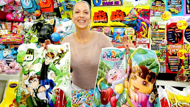 Pearl Bowman with the large selection of showbags. Images around the Gold Coast Show at the Bundall Racing Precinct. Pics Tim Marsden