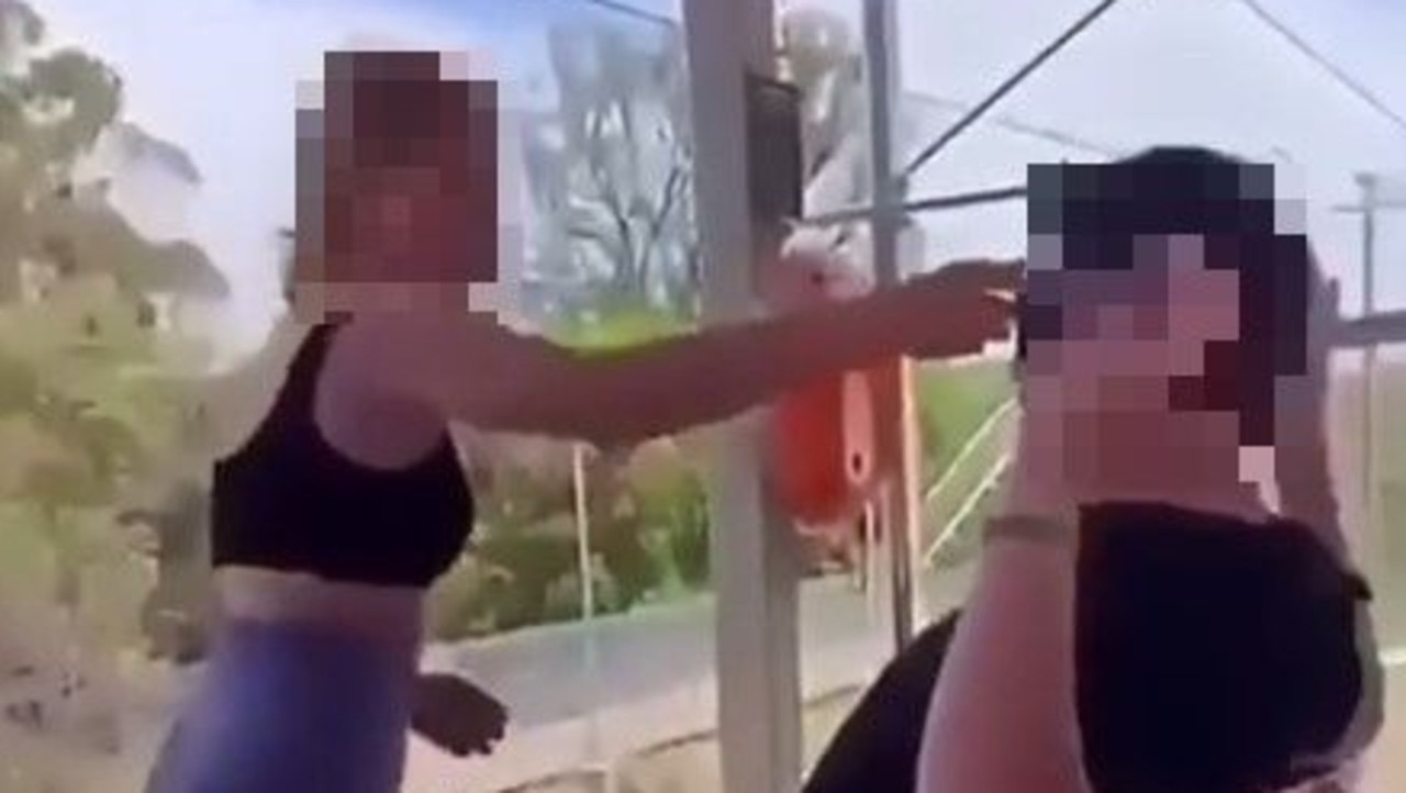 The youth can be seen on the video trying to surrender with his hands up, before a shirtless teenager unleashes a 10 second barrage of punches on him.