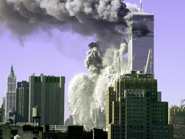 (FILES)The first tower of the World Trade Center collapses after being hit by a hijacked commercial aircraft 11 September 2001 in New York. September 11, 2008 marks the seventh anniversay of the terrorist attacks in New York City, at the Pentagon, and in Shanksville, Pennsylvania.  AFP PHOTO/Helene SELIGMAN