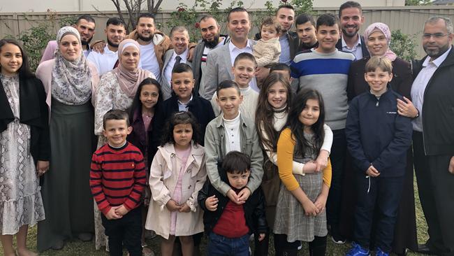 Local councillor Bilal El-Hayek, who is holding up six-month-old Noah, celebrates Eid with family members at his Greenacre home. Picture: Lawrence Machado