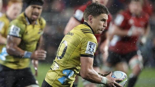 Beauden Barrett runs at the Crusaders defence. Picture: AP.