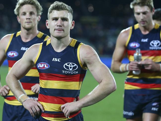 AFL - Adelaide Crows v Hawthorn - Round 14 - Adelaide Oval. Stunned crows leave the oval after the loss - Rory Laird, Rory Sloane and Daniel Talia. Picture Sarah Reed