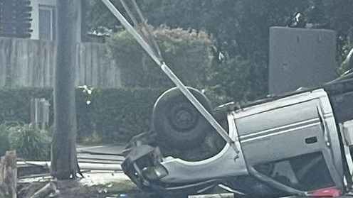 Car on roof at Maroochydore. Picture - Facebook.