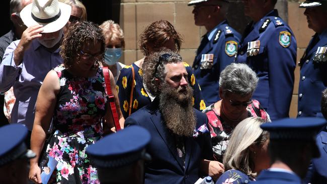 Family and friends of Kelly Foster leave the church at the Police funeral for Senior Constable Kelly Foster. Picture: NCA NewsWire / Damian Shaw