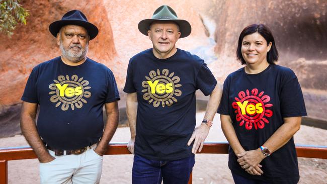 Can the Yes campaign pull off a miracle comeback? Yes supporters including Australian Prime Minister Anthony Albanese with Indigenous rights activist Noel Pearson (left) and Northern Territory Chief Minister Natasha Fyles at the base of Uluru. Picture: AFP