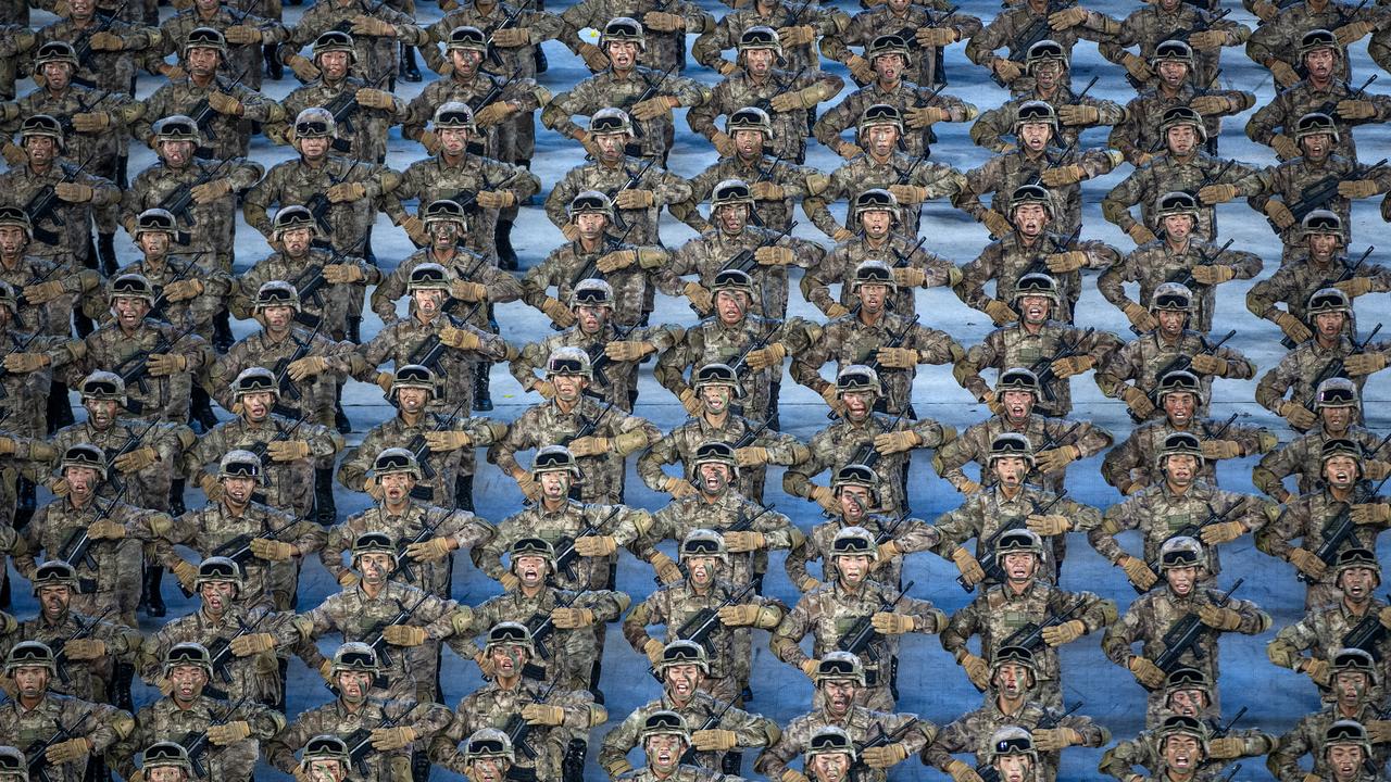 Actors dressed as military soldiers perform during a mass gala marking the 100th anniversary of the Communist Party on June 28, 2021 in Beijing. Picture: Kevin Frayer/Getty Images