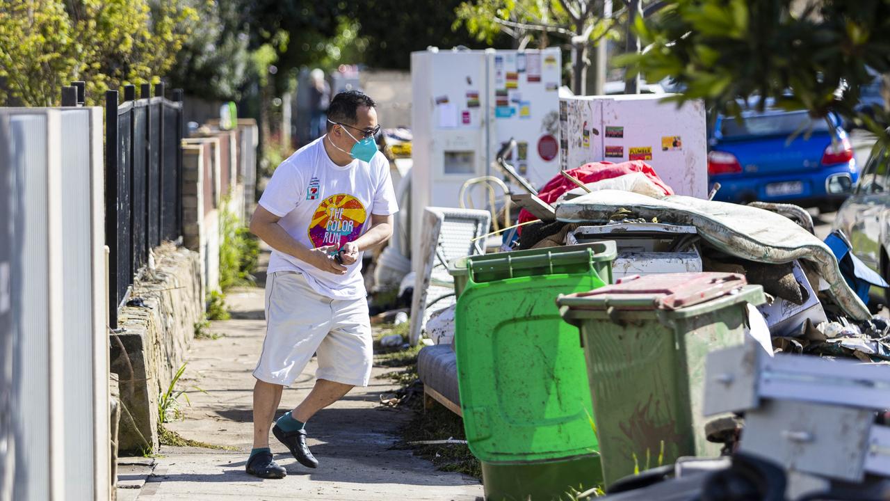 Maribyrnong residents clean up their flooded and destroyed belongings. Picture: NCA NewsWire / Aaron Francis