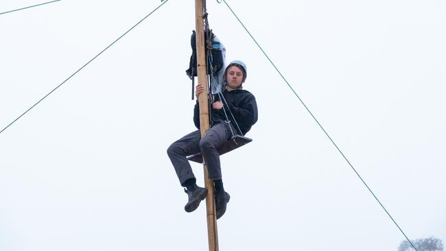 Hughie suspended at a logging couple in the West Kunanyi Range. Picture: Supplied.