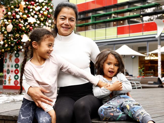 Jacque Capati with her children Harmony, 7, and Rhythm, 3, on the site of the new Rouse Hill Hospital. Picture: Jonathan Ng