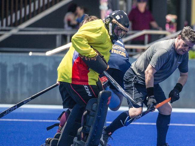Action in the Pan Pacific Masters Games Hockey tournament. Picture: Glenn Campbell
