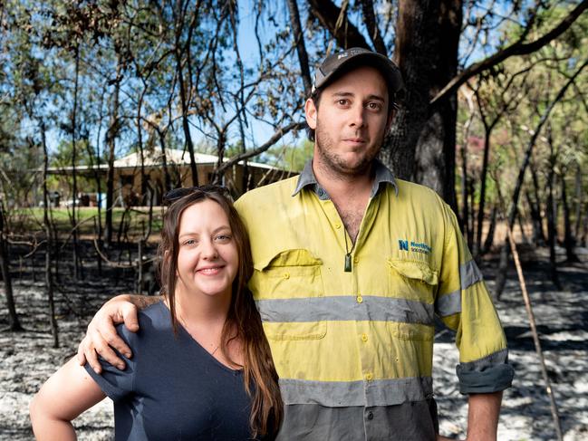 Leanne and Grant Hopkins had their house surrounded by a bushfire on Monday near Noonamah. Local volunteer firefighters saved their house from damage. Picture: Che Chorley