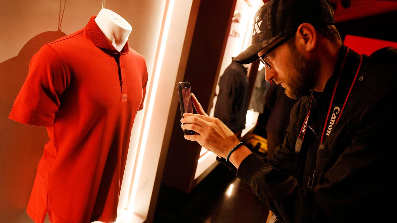 Fans get up close with Tiger Woods’ new red Sun Day Red shirt Kevork Djansezian/Getty Images/AFP