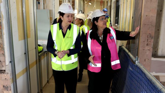 Premier Annastacia Palaszczuk and Education Minister Grace Grace inspect construction on the new state secondary college at Fortitude Valley. Picture: AAP Image/Richard Waugh