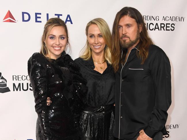 Billy Ray Cyrus with his ex-wife Tish and one of the couple’s five children, pop superstar, Miley Cyrus. Father and daughter are reportedly not speaking. Picture: Getty Images