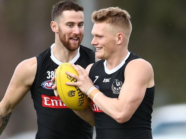 MELBOURNE, AUSTRALIA - SEPTEMBER 06:  Jeremy Howe of the Magpies and Adam Treloar of the Magpies compete for the ball during a Collingwood Magpies AFL training session at Holden Centre on September 6, 2018 in Melbourne, Australia.  (Photo by Scott Barbour/Getty Images)