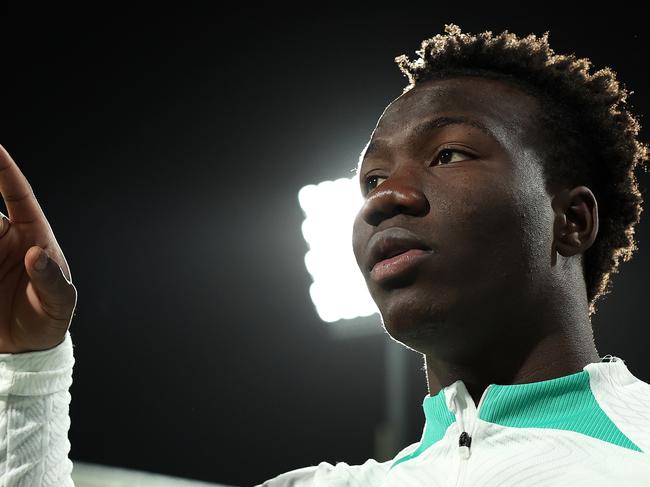 PERTH, AUSTRALIA - JUNE 10: Nestory Irankunda of Australia looks on before taking to the field during an Australia Socceroos press conference and training session at HBF Park on June 10, 2024 in Perth, Australia. (Photo by Paul Kane/Getty Images)