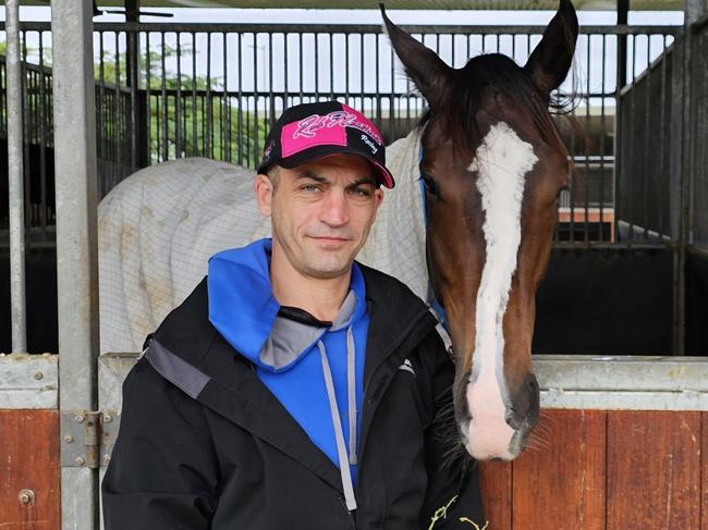 Rob Heathcote's racing manager and potential soon-to-be training partner Jarred Coetzee, pictured with Heathcote's recent winner Cunnamulla Fella.