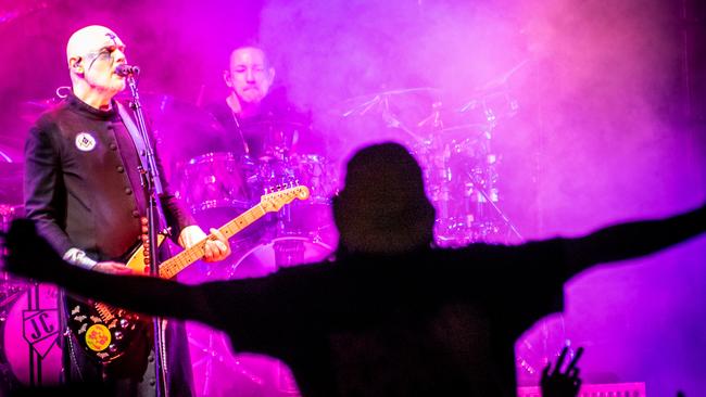 Billy Corgan, Jimmy Chamberlin and a happy fan on Saturday night. Picture: Andrew Treadwell