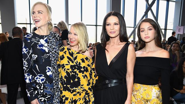 Catherine Zeta-Jones, 49, joined by Michael Douglas, 74, and daughter Carys  at Michael Kors NYFW