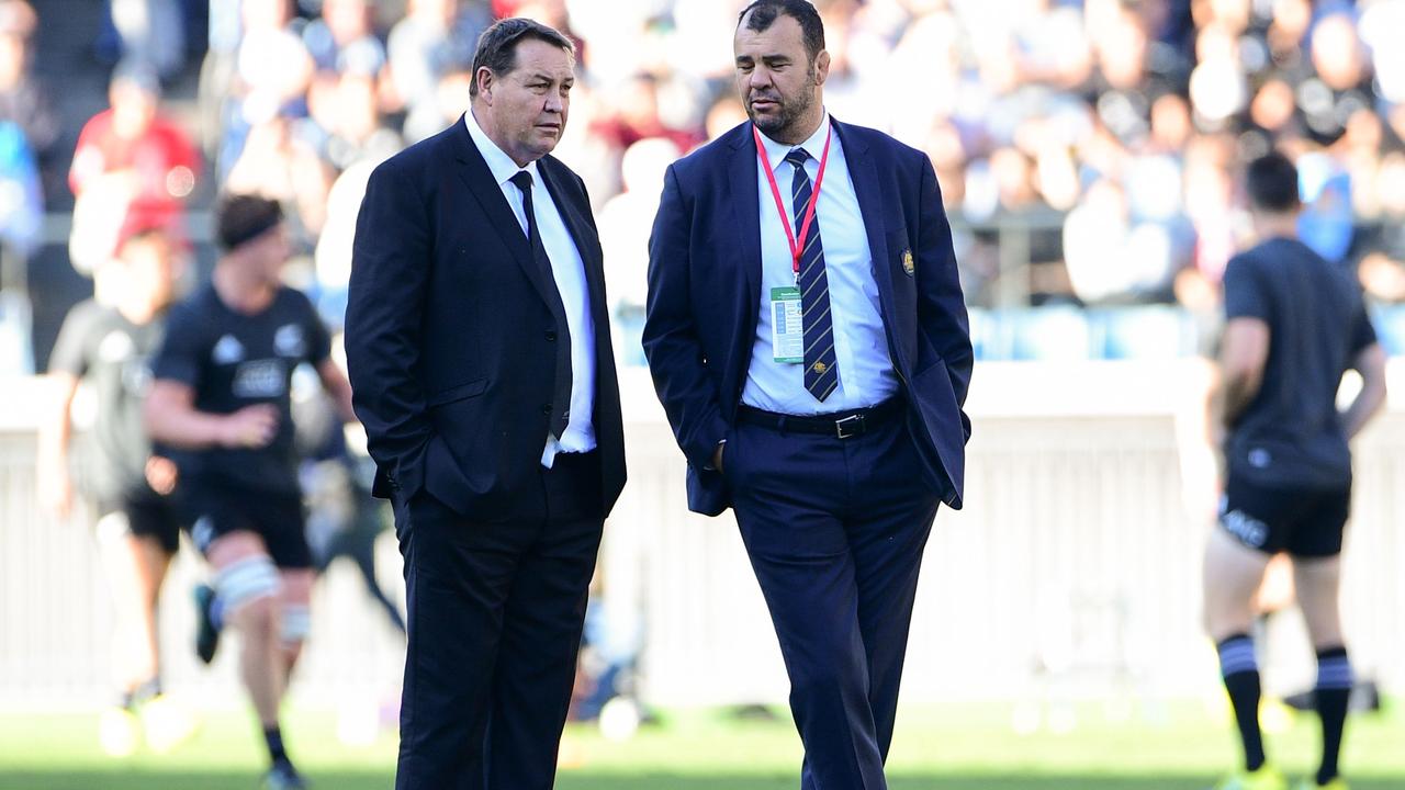 New Zealand coach Steve Hansen and Australia rival Michael Cheika chew the fat.