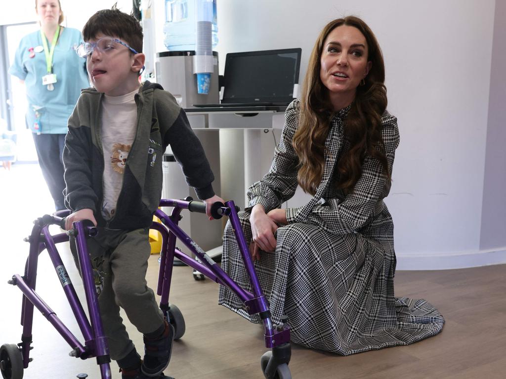 Catherine, Princess of Wales (C) visits Ty Hafan and played with the children. Picture: AFP