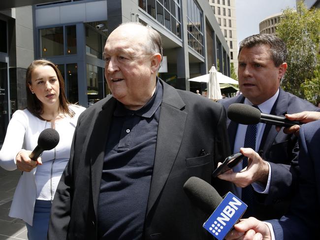 Adelaide Archbishop Philip Wilson arrives at Newcastle Local Court on Wednesday, for the start of his trial on charges that he covered up sexual abuse. Picture: AAP /Darren Pateman